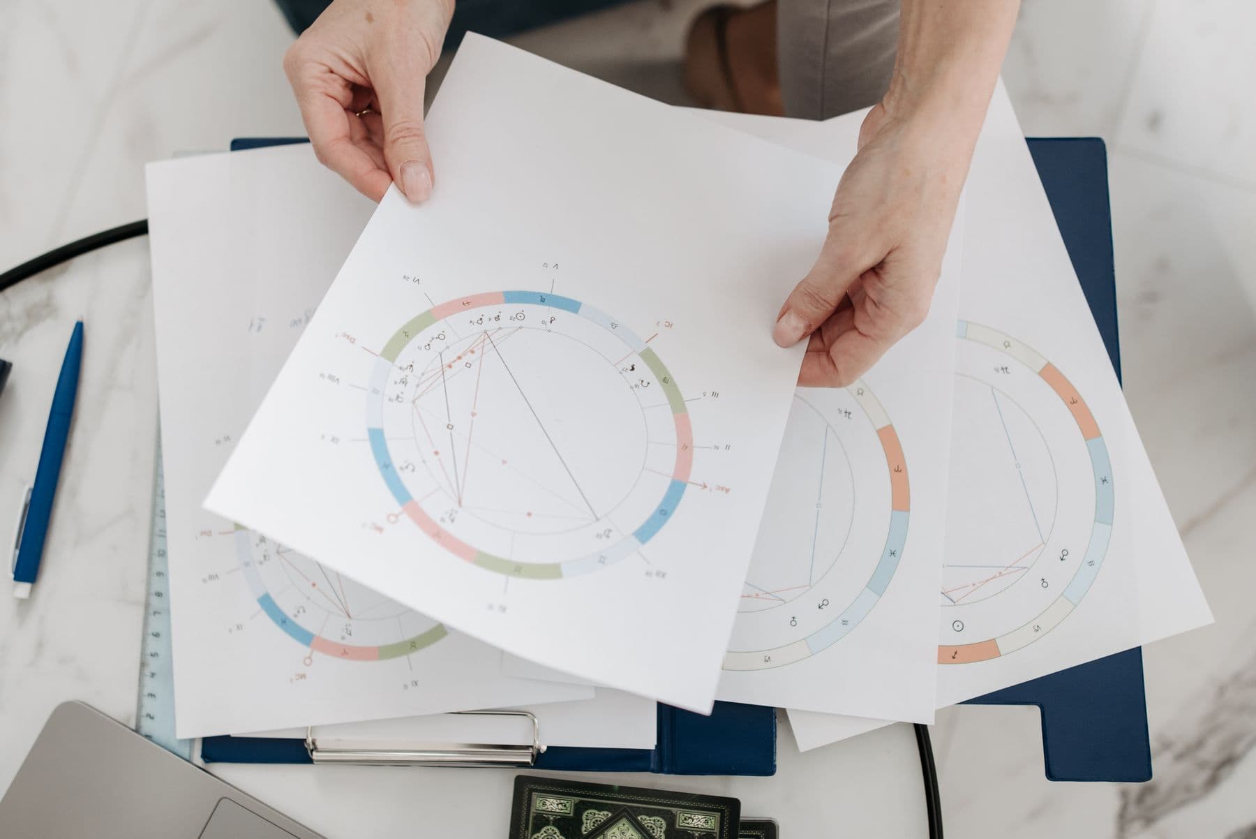 Astrological charts being reviewed during a consultation